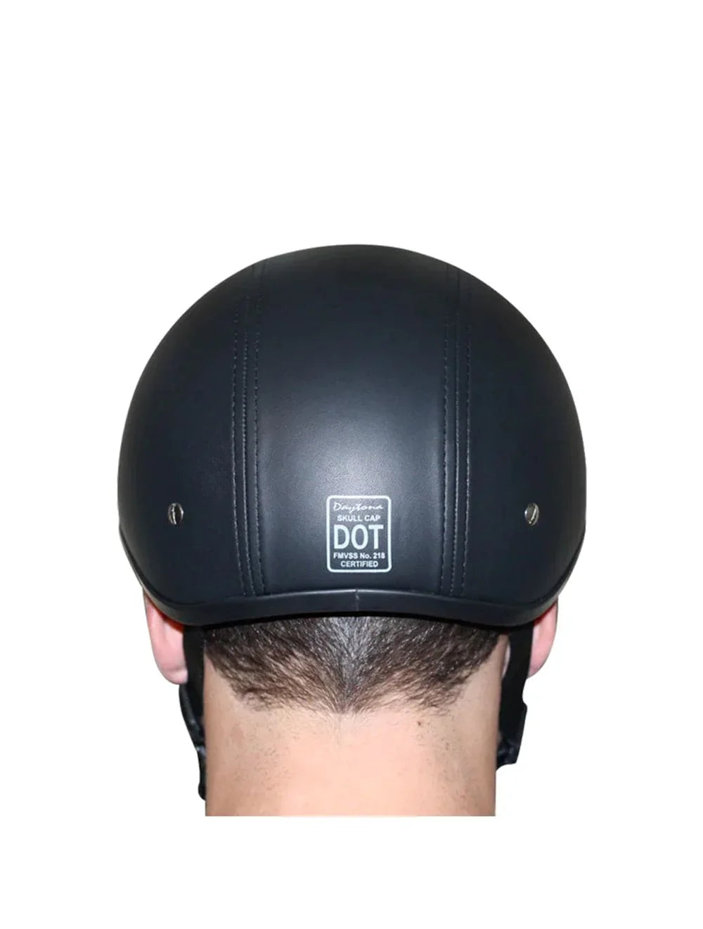 Back view of rider wearing Daytona Skull Cap Leather Covered Helmet – DOT Certification visible – Wide Wing Store